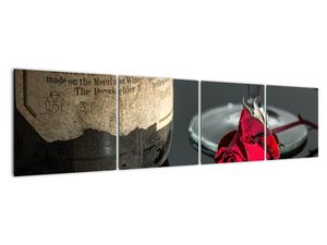 Červená ruža na stole - obrazy do bytu