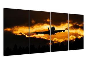 Pristávajúce lietadlo pri západe slnka - obraz